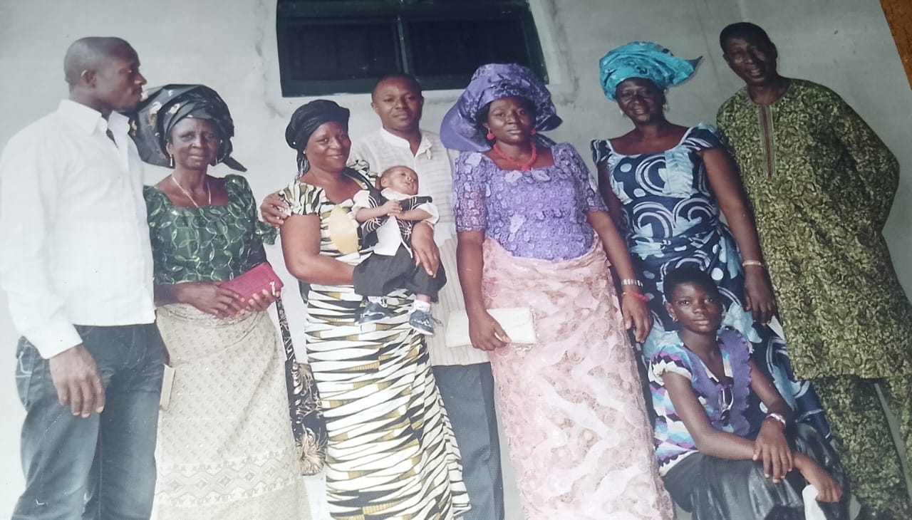A large group of family members gathered indoors