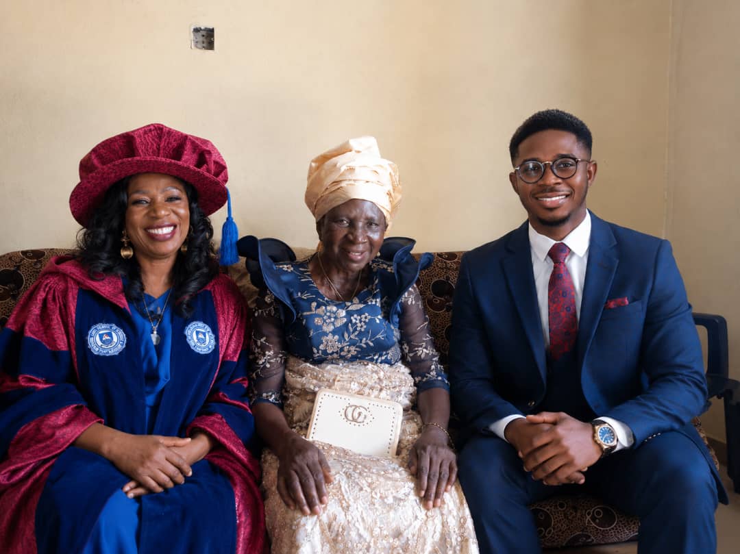 Josephine seated between family members